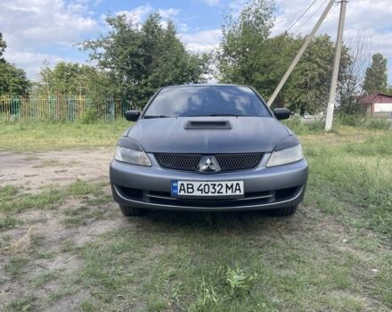 Сірий Міцубісі Lancer, об'ємом двигуна 2 л та пробігом 152 тис. км за 4000 $, фото 1 на Automoto.ua