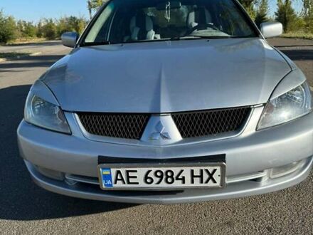 Сірий Міцубісі Lancer, об'ємом двигуна 1.58 л та пробігом 230 тис. км за 4800 $, фото 1 на Automoto.ua