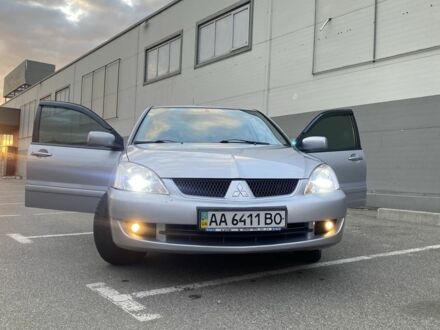 Міцубісі Lancer 2006 у Києві на Automoto.ua Сірий Міцубісі Lancer, об'ємом двигуна 1.6 л та пробігом 148 тис. км за 5300 $, фото 1 на Automoto.ua