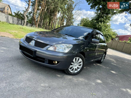 Мицубиси Лансер 2006 в Харькове на Automoto.ua Серый Мицубиси Лансер, объемом двигателя 1.6 л и пробегом 188 тыс. км за 5490 $, фото 1 на Automoto.ua