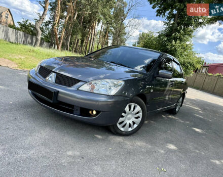 Сірий Міцубісі Lancer, об'ємом двигуна 1.6 л та пробігом 188 тис. км за 5490 $, фото 1 на Automoto.ua