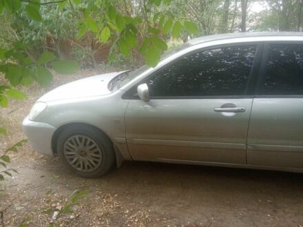 Сірий Міцубісі Lancer, об'ємом двигуна 1.6 л та пробігом 3 тис. км за 3200 $, фото 1 на Automoto.ua