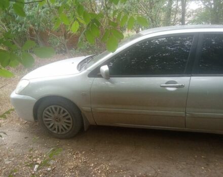 Серый Мицубиси Лансер, объемом двигателя 1.6 л и пробегом 3 тыс. км за 3200 $, фото 1 на Automoto.ua