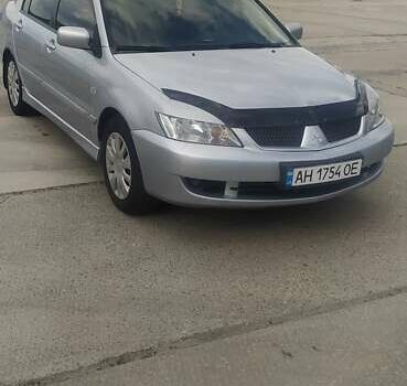 Сірий Міцубісі Lancer, об'ємом двигуна 1.6 л та пробігом 212 тис. км за 5000 $, фото 1 на Automoto.ua