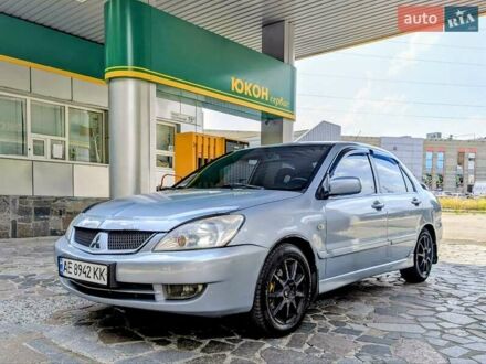 Мицубиси Лансер 2006 в Днепре (Днепропетровске) на Automoto.ua Серый Мицубиси Лансер, объемом двигателя 1.6 л и пробегом 250 тыс. км за 3300 $, фото 1 на Automoto.ua