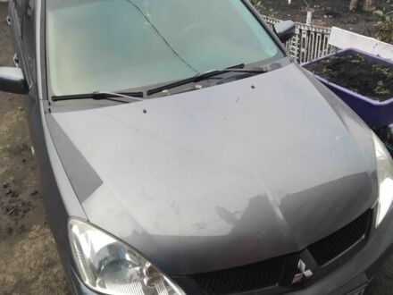 Сірий Міцубісі Lancer, об'ємом двигуна 1.6 л та пробігом 202 тис. км за 3300 $, фото 1 на Automoto.ua