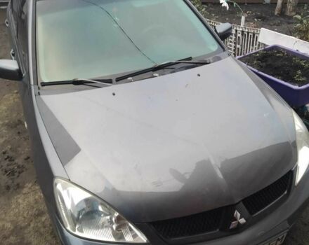 Сірий Міцубісі Lancer, об'ємом двигуна 1.6 л та пробігом 202 тис. км за 3300 $, фото 1 на Automoto.ua