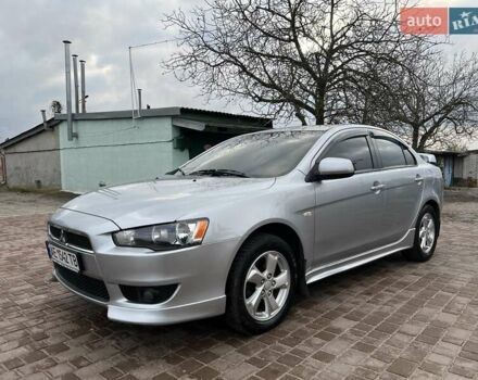 Серый Мицубиси Лансер, объемом двигателя 2 л и пробегом 180 тыс. км за 6799 $, фото 1 на Automoto.ua