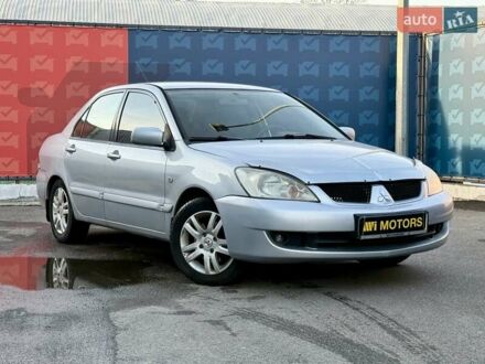 Серый Мицубиси Лансер, объемом двигателя 1.6 л и пробегом 395 тыс. км за 4900 $, фото 1 на Automoto.ua