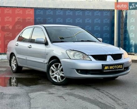 Сірий Міцубісі Lancer, об'ємом двигуна 1.6 л та пробігом 395 тис. км за 4900 $, фото 1 на Automoto.ua