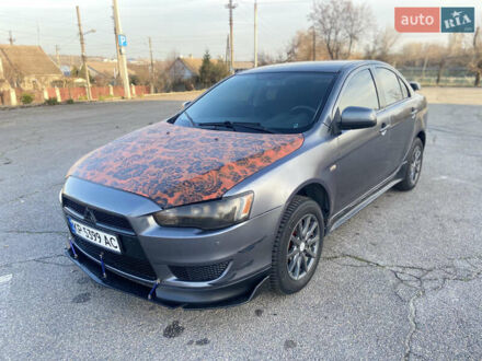 Серый Мицубиси Лансер, объемом двигателя 1.5 л и пробегом 224 тыс. км за 6300 $, фото 1 на Automoto.ua