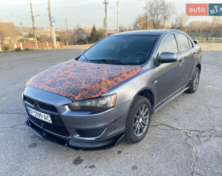 Серый Мицубиси Лансер, объемом двигателя 1.5 л и пробегом 224 тыс. км за 6300 $, фото 1 на Automoto.ua