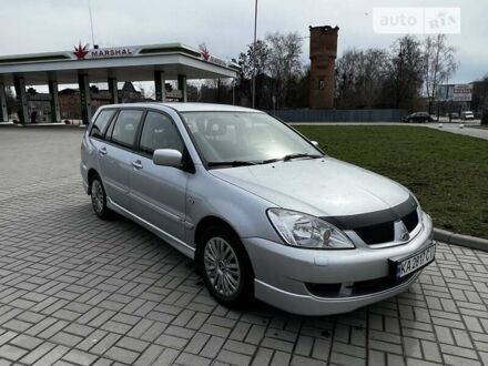 Сірий Міцубісі Lancer, об'ємом двигуна 1.6 л та пробігом 250 тис. км за 4300 $, фото 1 на Automoto.ua