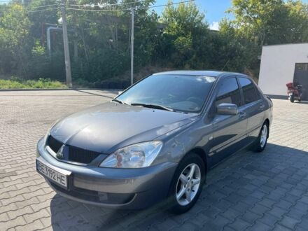 Сірий Міцубісі Lancer, об'ємом двигуна 1.6 л та пробігом 161 тис. км за 4900 $, фото 1 на Automoto.ua