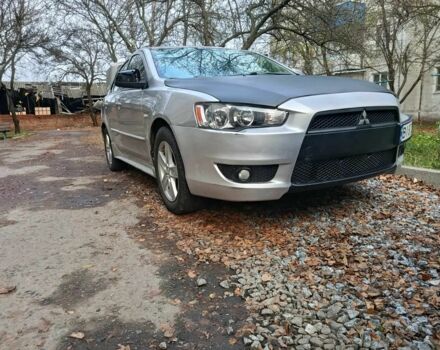 Серый Мицубиси Лансер, объемом двигателя 1.5 л и пробегом 268 тыс. км за 5944 $, фото 1 на Automoto.ua