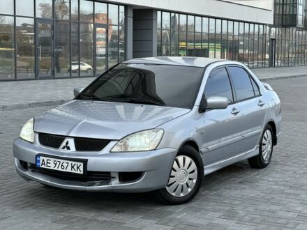 Сірий Міцубісі Lancer, об'ємом двигуна 1.6 л та пробігом 200 тис. км за 3900 $, фото 1 на Automoto.ua