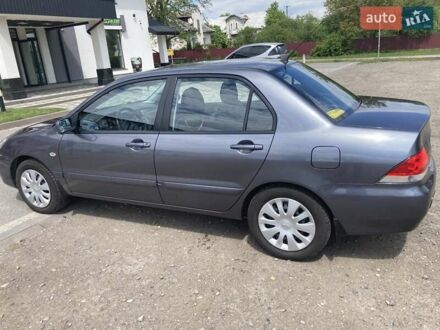 Сірий Міцубісі Lancer, об'ємом двигуна 1.59 л та пробігом 44 тис. км за 6200 $, фото 1 на Automoto.ua