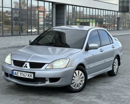 Сірий Міцубісі Lancer, об'ємом двигуна 1.6 л та пробігом 200 тис. км за 3900 $, фото 1 на Automoto.ua