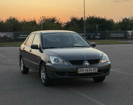 Сірий Міцубісі Lancer, об'ємом двигуна 1.6 л та пробігом 241 тис. км за 3999 $, фото 1 на Automoto.ua