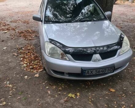 Сірий Міцубісі Lancer, об'ємом двигуна 1.6 л та пробігом 282 тис. км за 3403 $, фото 1 на Automoto.ua