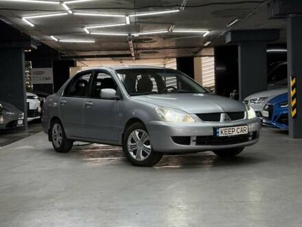 Серый Мицубиси Лансер, объемом двигателя 1.58 л и пробегом 271 тыс. км за 4200 $, фото 1 на Automoto.ua