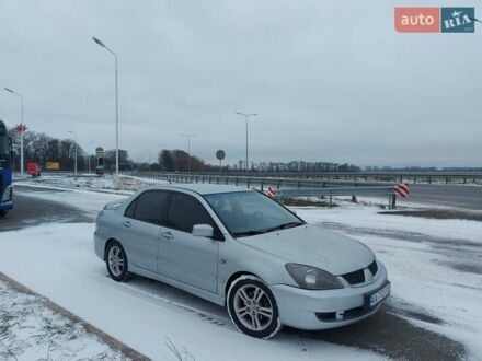 Сірий Міцубісі Lancer, об'ємом двигуна 2 л та пробігом 253 тис. км за 4200 $, фото 1 на Automoto.ua