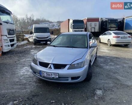 Серый Мицубиси Лансер, объемом двигателя 1.6 л и пробегом 310 тыс. км за 3850 $, фото 1 на Automoto.ua