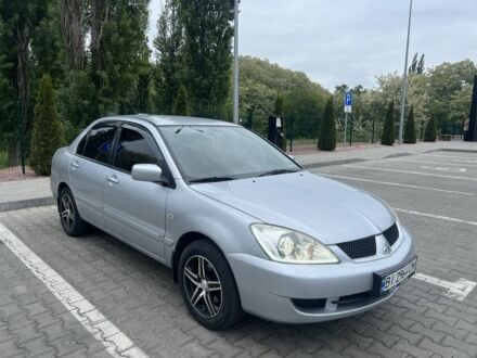 Сірий Міцубісі Lancer, об'ємом двигуна 1.6 л та пробігом 220 тис. км за 4200 $, фото 1 на Automoto.ua