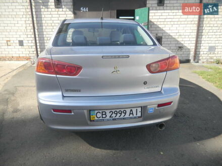 Сірий Міцубісі Lancer, об'ємом двигуна 2 л та пробігом 103 тис. км за 7300 $, фото 1 на Automoto.ua