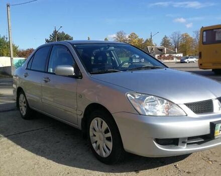 Сірий Міцубісі Lancer, об'ємом двигуна 1.6 л та пробігом 142 тис. км за 4700 $, фото 1 на Automoto.ua