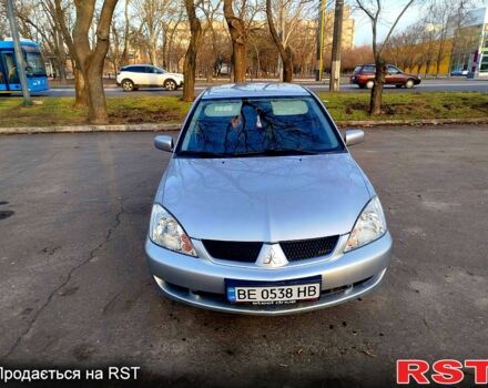 Серый Мицубиси Лансер, объемом двигателя 1.6 л и пробегом 300 тыс. км за 4200 $, фото 1 на Automoto.ua
