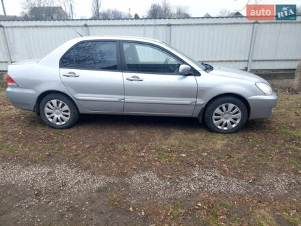 Міцубісі Lancer 2007 у Царичанке на Automoto.ua Сірий Міцубісі Lancer, об'ємом двигуна 1.58 л та пробігом 220 тис. км за 5000 $, фото 1 на Automoto.ua