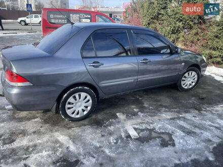Мицубиси Лансер 2007 в Киеве на Automoto.ua Серый Мицубиси Лансер, объемом двигателя 1.58 л и пробегом 365 тыс. км за 4000 $, фото 1 на Automoto.ua