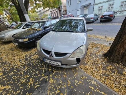 Сірий Міцубісі Lancer, об'ємом двигуна 1.6 л та пробігом 199 тис. км за 1450 $, фото 1 на Automoto.ua
