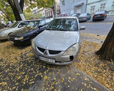 Серый Мицубиси Лансер, объемом двигателя 1.6 л и пробегом 199 тыс. км за 1450 $, фото 1 на Automoto.ua