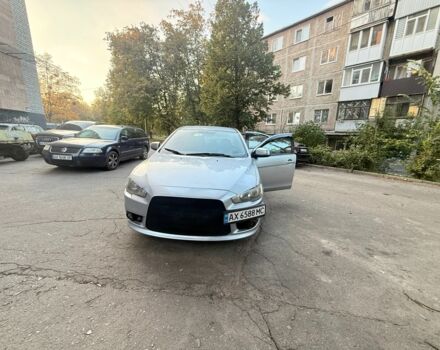 Серый Мицубиси Лансер, объемом двигателя 2 л и пробегом 250 тыс. км за 5320 $, фото 1 на Automoto.ua