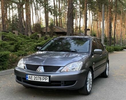 Сірий Міцубісі Lancer, об'ємом двигуна 1.6 л та пробігом 250 тис. км за 3999 $, фото 1 на Automoto.ua