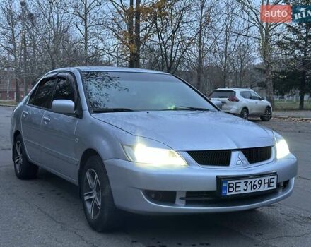 Серый Мицубиси Лансер, объемом двигателя 1.6 л и пробегом 210 тыс. км за 4600 $, фото 1 на Automoto.ua