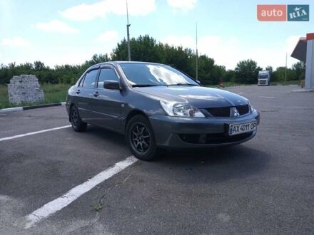 Міцубісі Lancer 2007 у Новой Водолаге на Automoto.ua Сірий Міцубісі Lancer, об'ємом двигуна 1.6 л та пробігом 188 тис. км за 5000 $, фото 1 на Automoto.ua