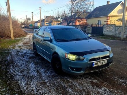 Серый Мицубиси Лансер, объемом двигателя 2 л и пробегом 225 тыс. км за 5500 $, фото 1 на Automoto.ua