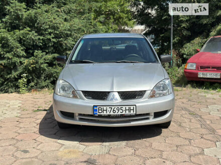 Сірий Міцубісі Lancer, об'ємом двигуна 1.3 л та пробігом 255 тис. км за 4350 $, фото 1 на Automoto.ua