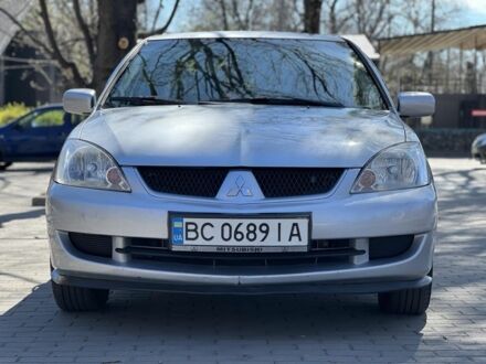 Сірий Міцубісі Lancer, об'ємом двигуна 1.6 л та пробігом 276 тис. км за 4250 $, фото 1 на Automoto.ua