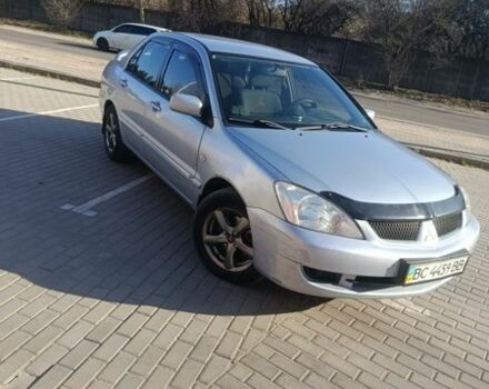 Серый Мицубиси Лансер, объемом двигателя 1.6 л и пробегом 270 тыс. км за 3000 $, фото 1 на Automoto.ua