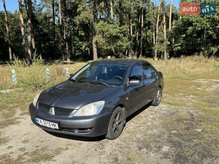 Сірий Міцубісі Lancer, об'ємом двигуна 1.58 л та пробігом 278 тис. км за 3800 $, фото 1 на Automoto.ua