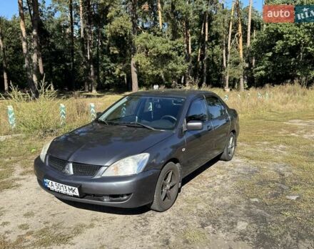 Сірий Міцубісі Lancer, об'ємом двигуна 1.58 л та пробігом 278 тис. км за 3800 $, фото 1 на Automoto.ua