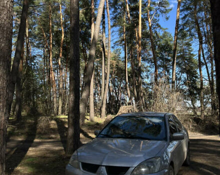 Сірий Міцубісі Lancer, об'ємом двигуна 1.6 л та пробігом 248 тис. км за 3000 $, фото 1 на Automoto.ua
