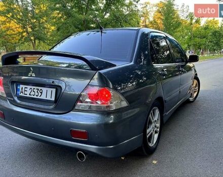 Сірий Міцубісі Lancer, об'ємом двигуна 2 л та пробігом 193 тис. км за 5000 $, фото 1 на Automoto.ua