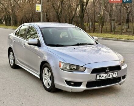 Серый Мицубиси Лансер, объемом двигателя 2 л и пробегом 178 тыс. км за 6150 $, фото 1 на Automoto.ua