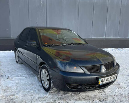 Серый Мицубиси Лансер, объемом двигателя 1.58 л и пробегом 360 тыс. км за 4200 $, фото 1 на Automoto.ua