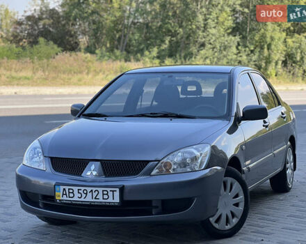 Сірий Міцубісі Lancer, об'ємом двигуна 1.6 л та пробігом 189 тис. км за 3699 $, фото 1 на Automoto.ua